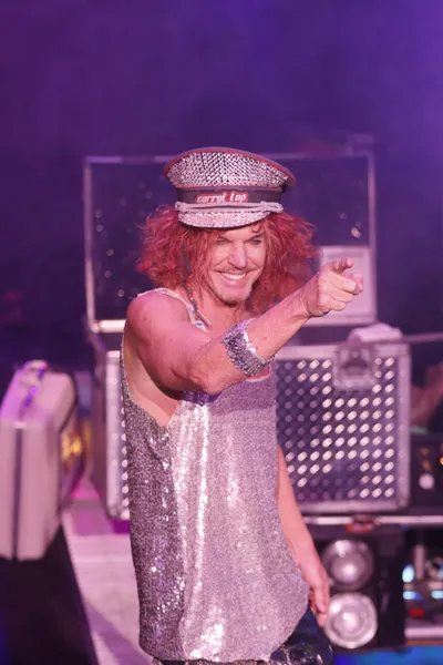 Carrot Top performing on stage